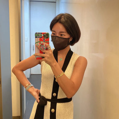 Korean model taking a mirror selfie - showing off the translucent mask by SSUNSU